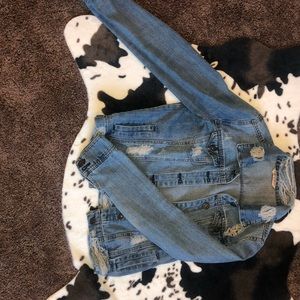 Distressed denim jacket